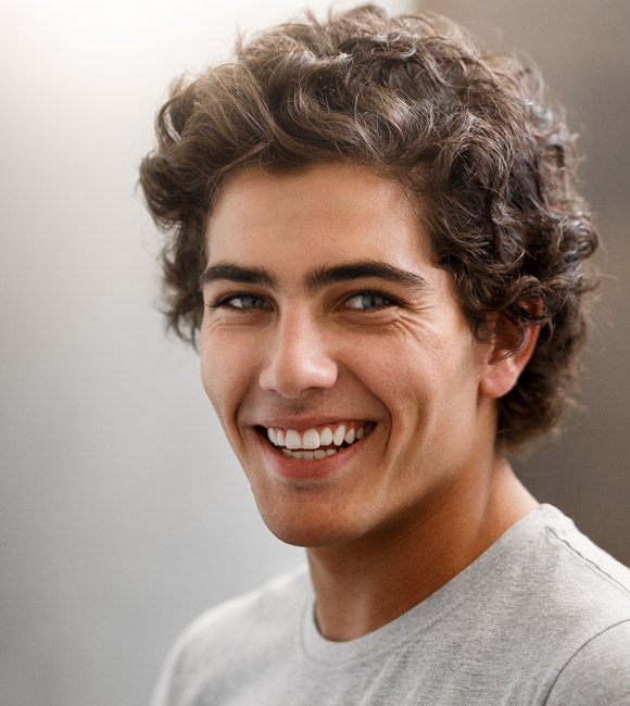 headshot of man smiling